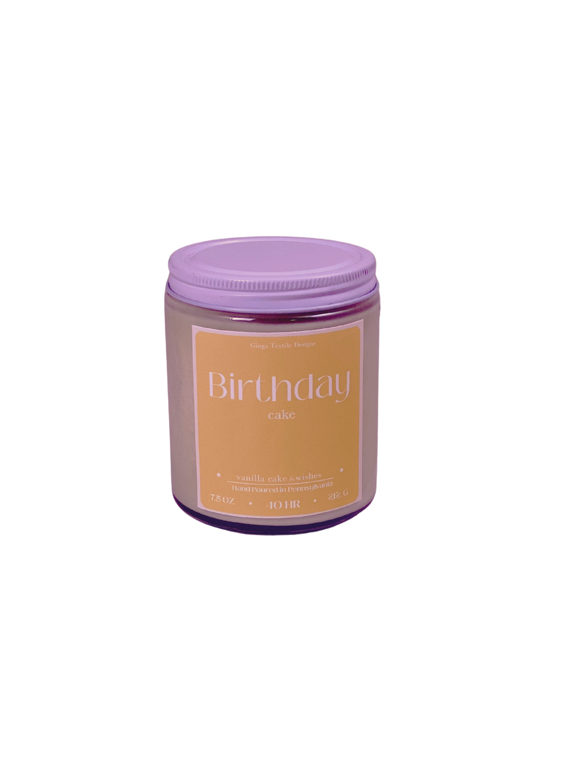 Candle jar labeled 'Birthday Cake' with a white lid on a white background