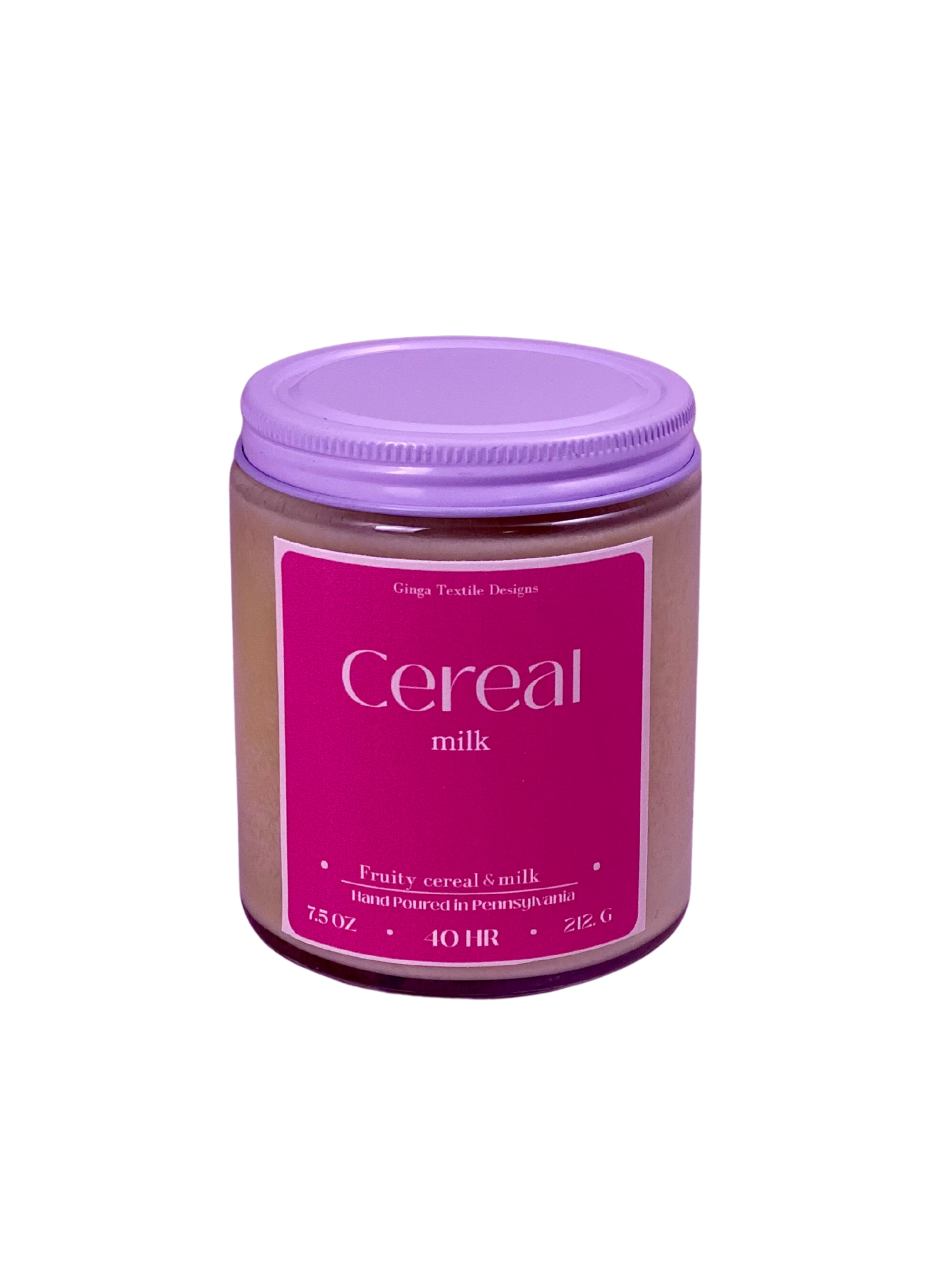 Scented candle jar of cereal milk with a white lid on a white background