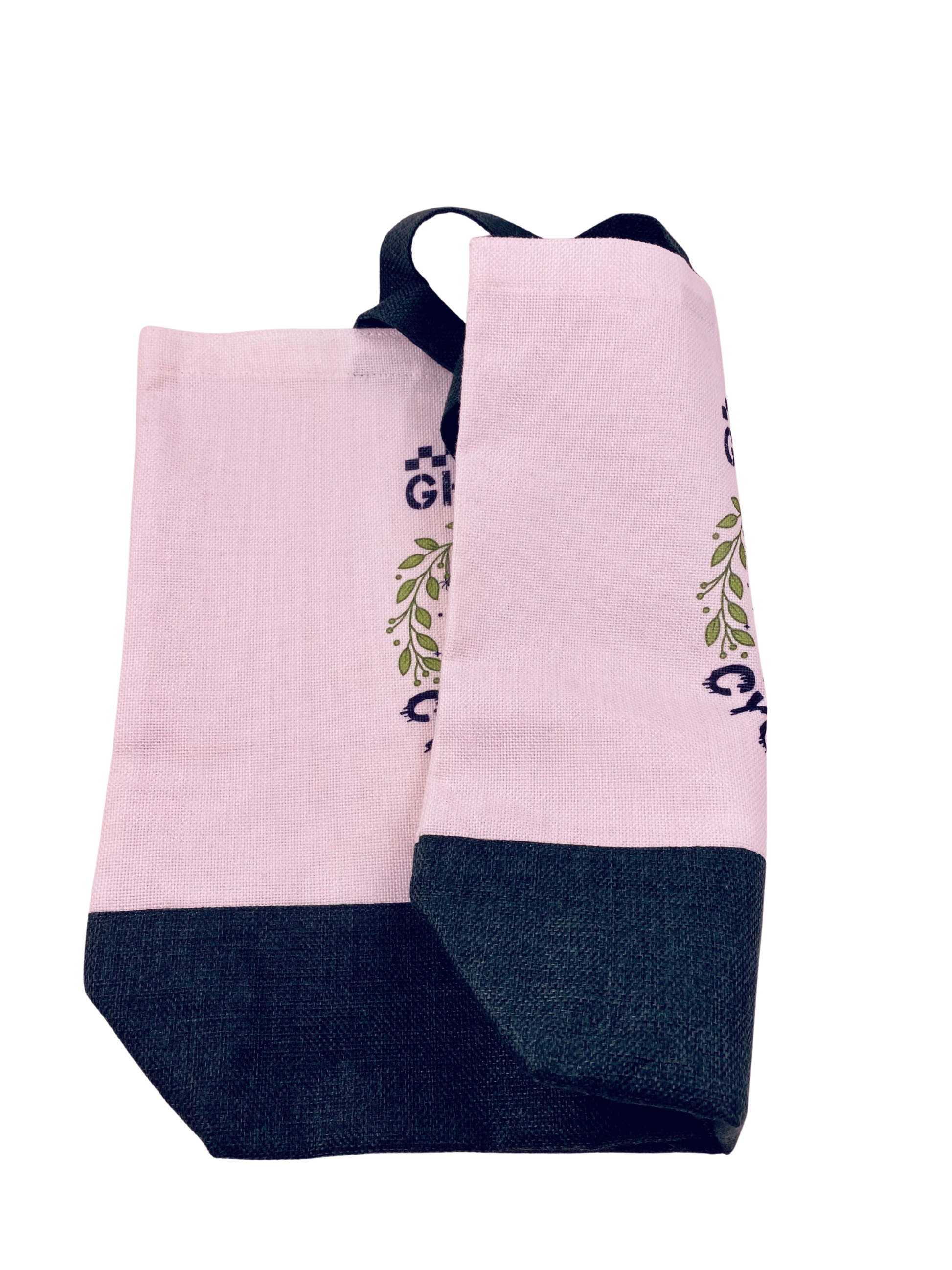partially folded canvas tote bag to show double sided print with a two-tone color