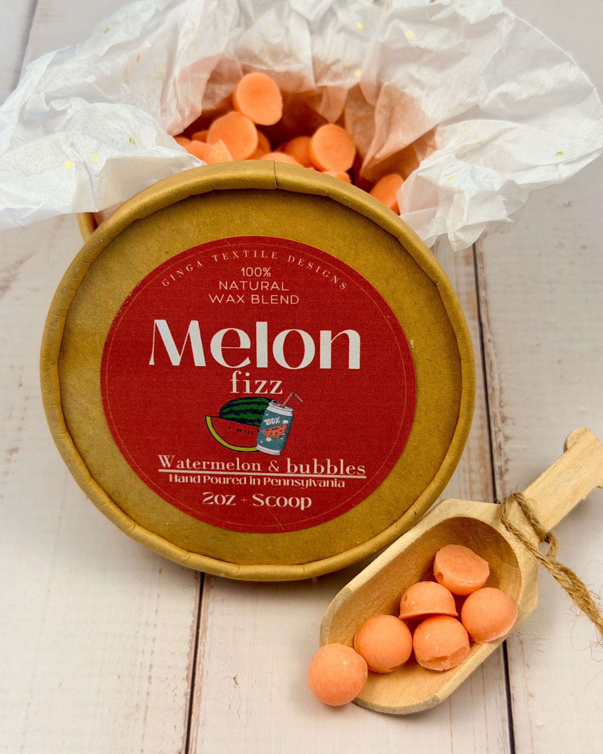 Melon fizz product with packaging and scoop on a wooden surface