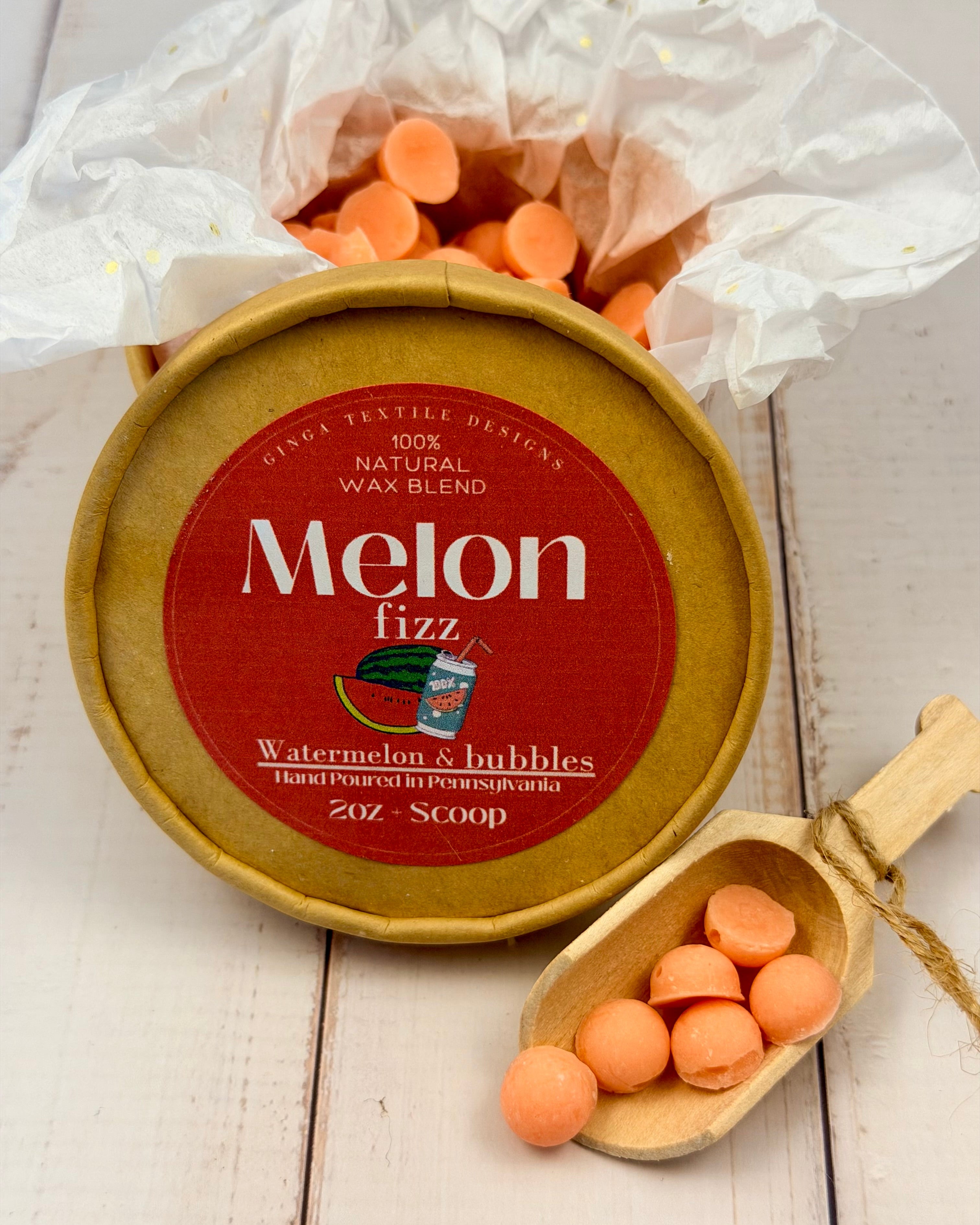 Melon fizz product with packaging and scoop on a wooden surface