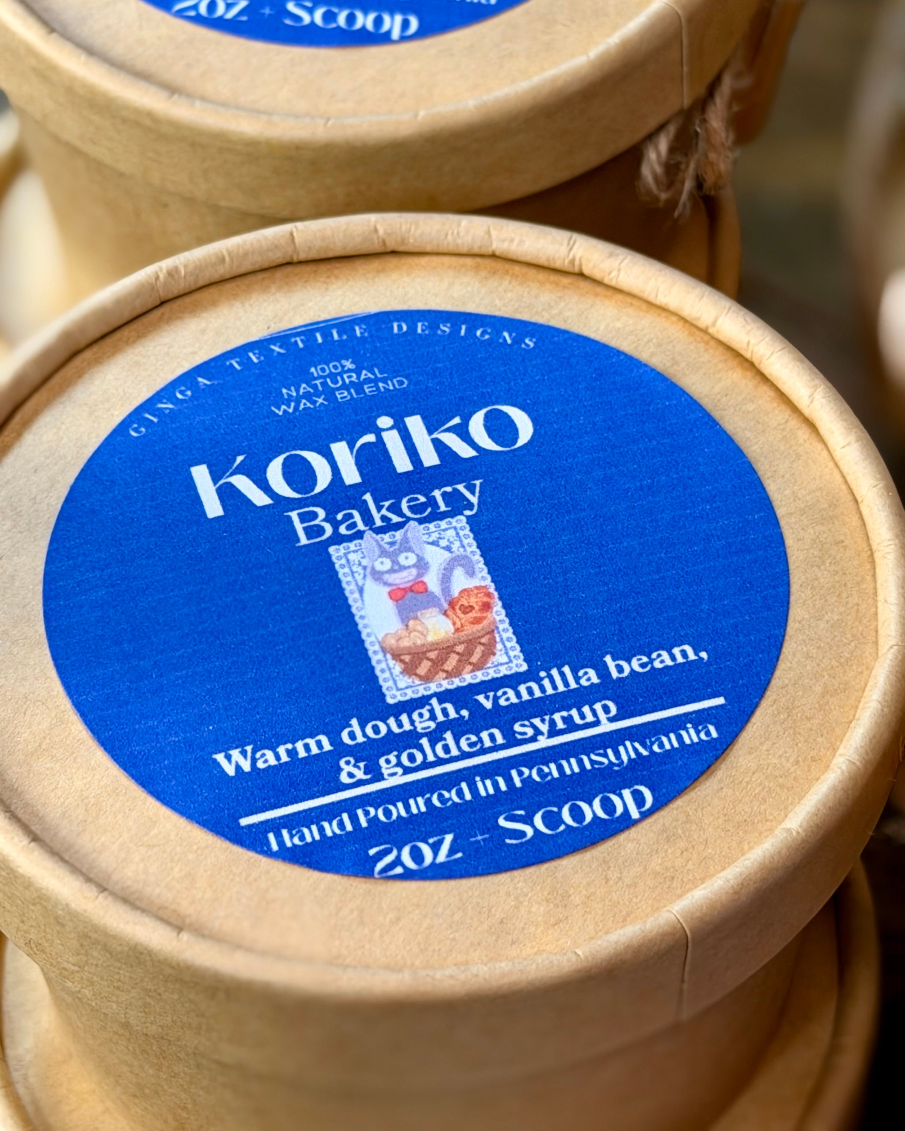 Koriko Bakery container with blue label on a wooden surface