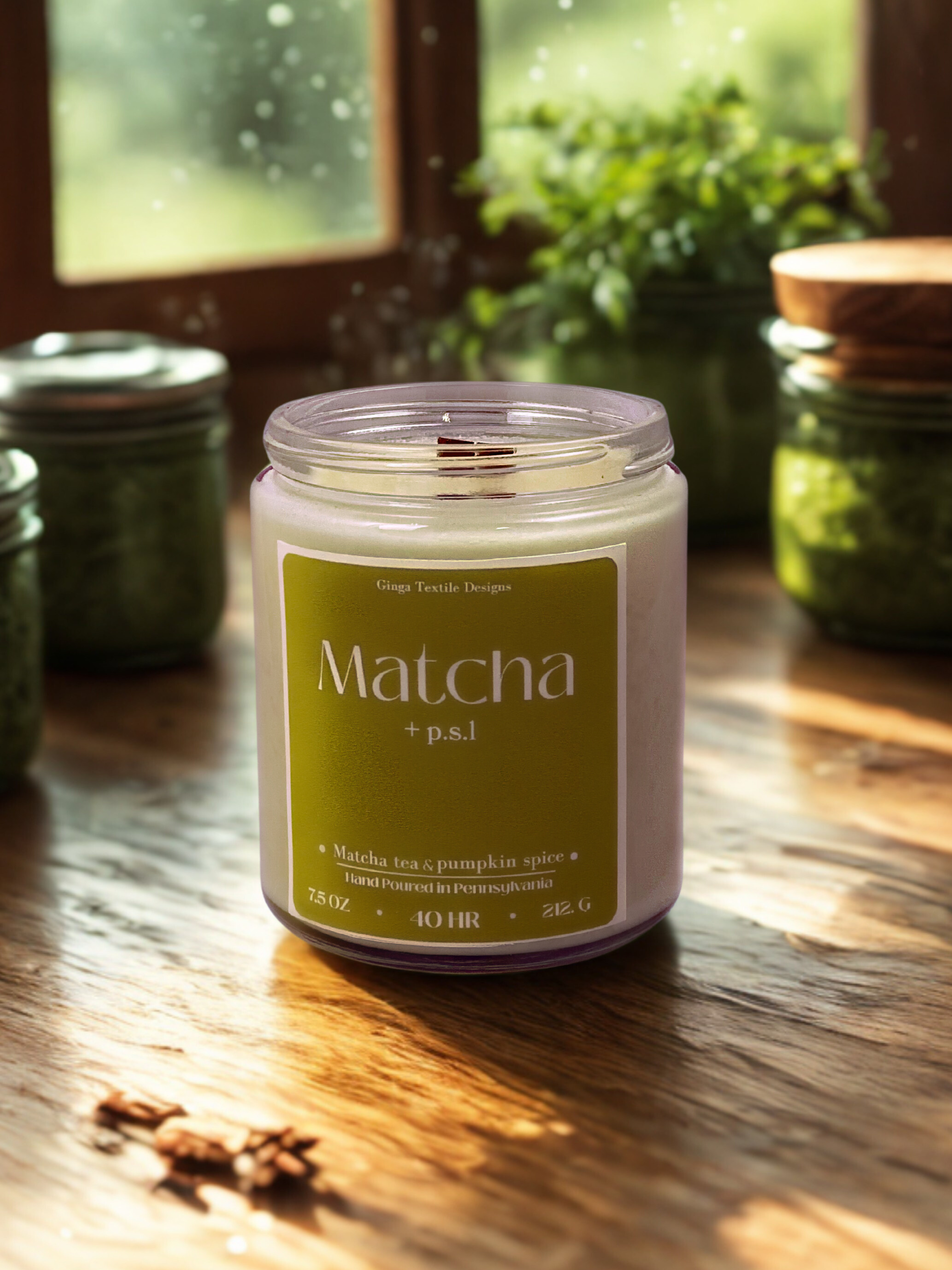 Matcha candle on a wooden surface with a window and plants in the background